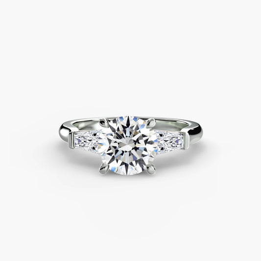 Bague trois pierres (pierres latérales baguette)