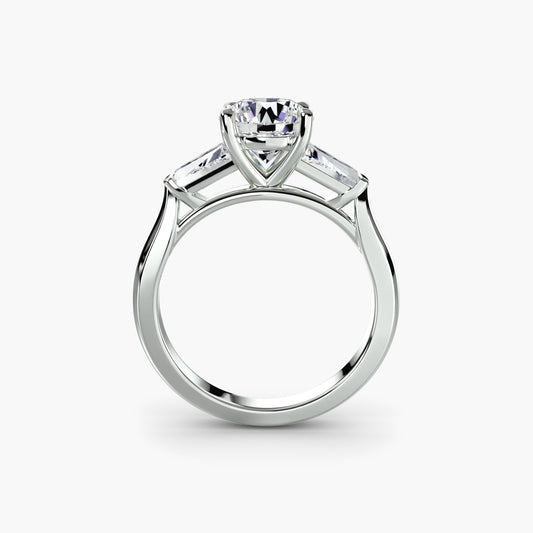 Bague trois pierres (pierres latérales baguette)