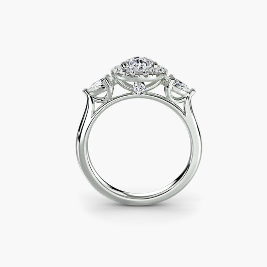 Bague trois pierres avec halo