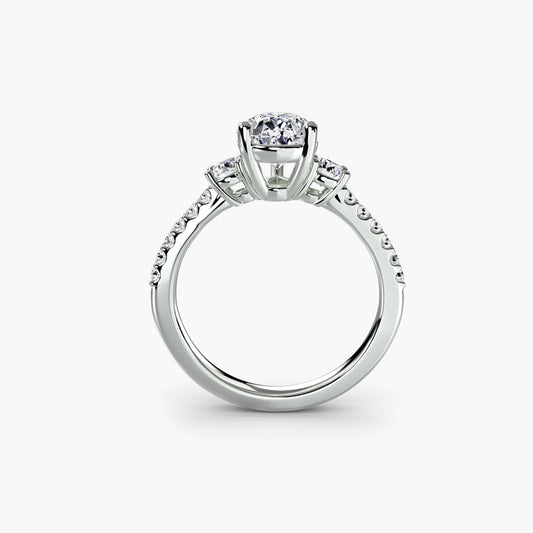 Bague trois pierres avec anneau pavé 5